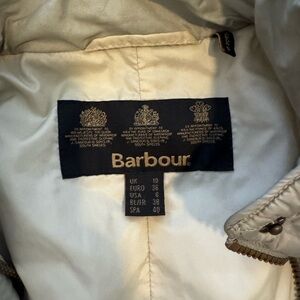 Mint/seafoam green Barbour jacket.